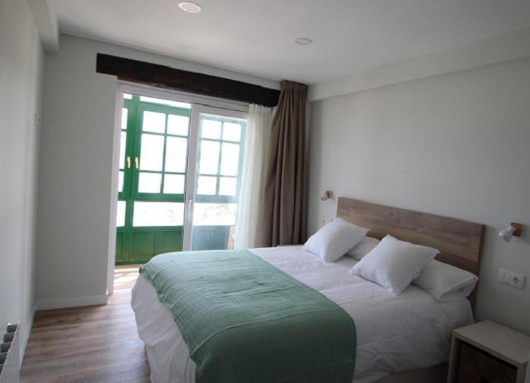 Apartamentos El Muelle Comillas Eksteriør billede